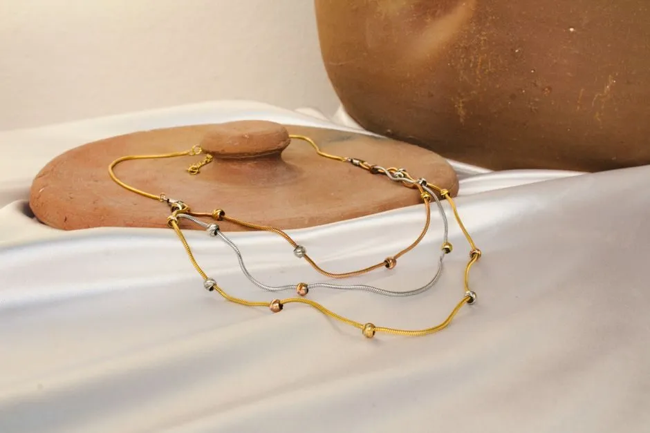Dây chuyền vàng 18K dạng vỉ hạt